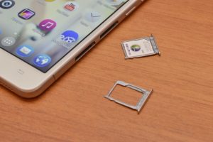 We take out a SIM card from the iPhone